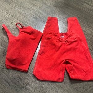 Red Bombshell set. One shoulder sports bra Med and leggings Small